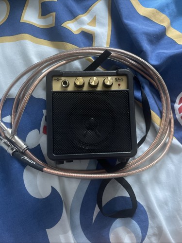 Guitar amp with cable - with,